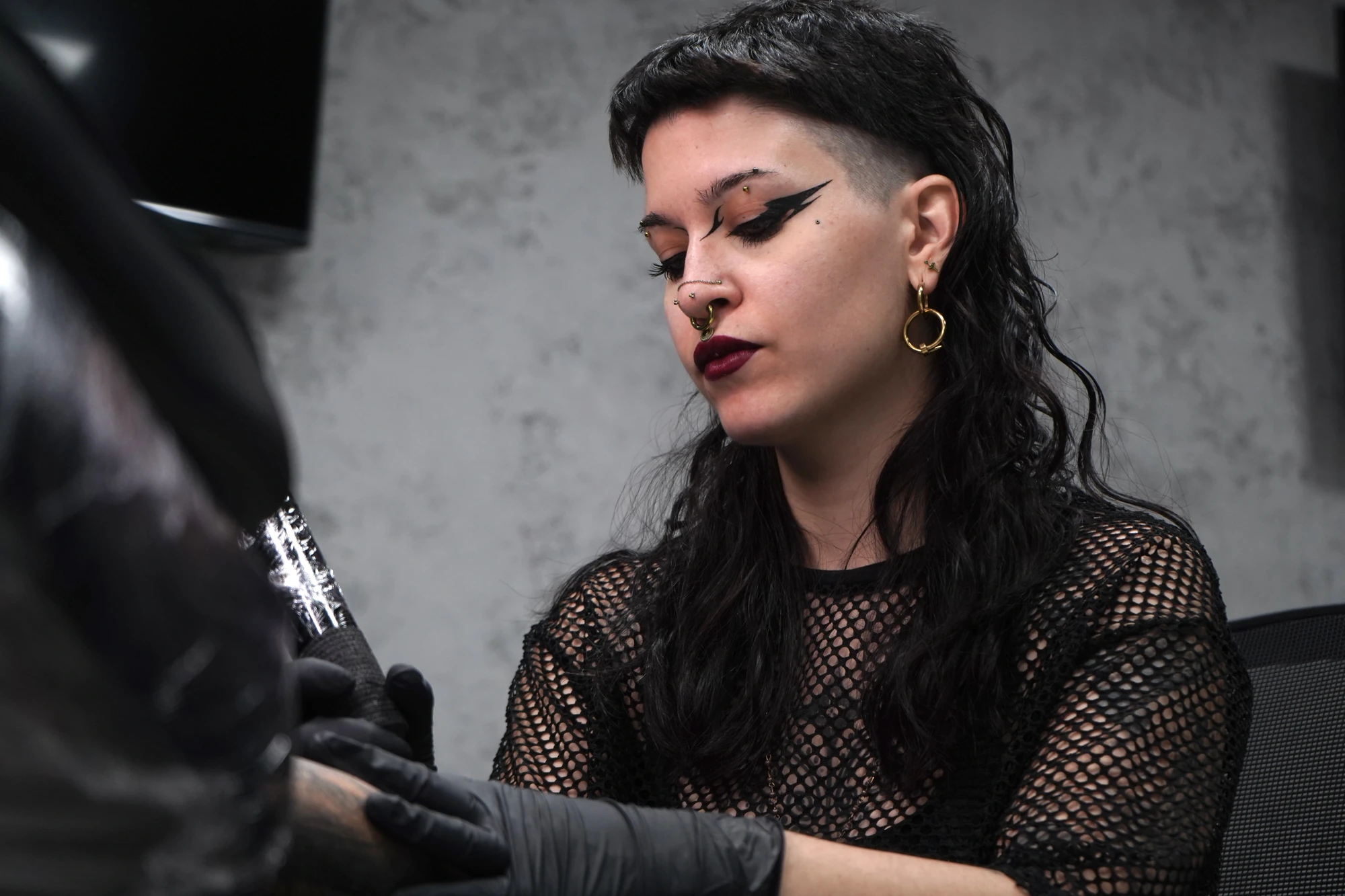 Michelle (Nezu), tattoo artist en The Club Tattoo & Barber